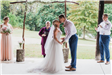 Bride and Groom Kiss at the Wedding Altar - Rebecca Stevenson Photography