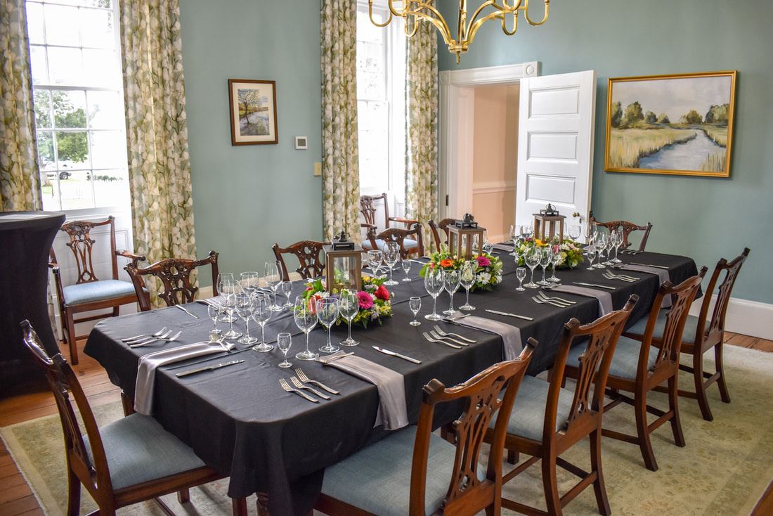 Boardroom with Flowers - The Main Event by Emily